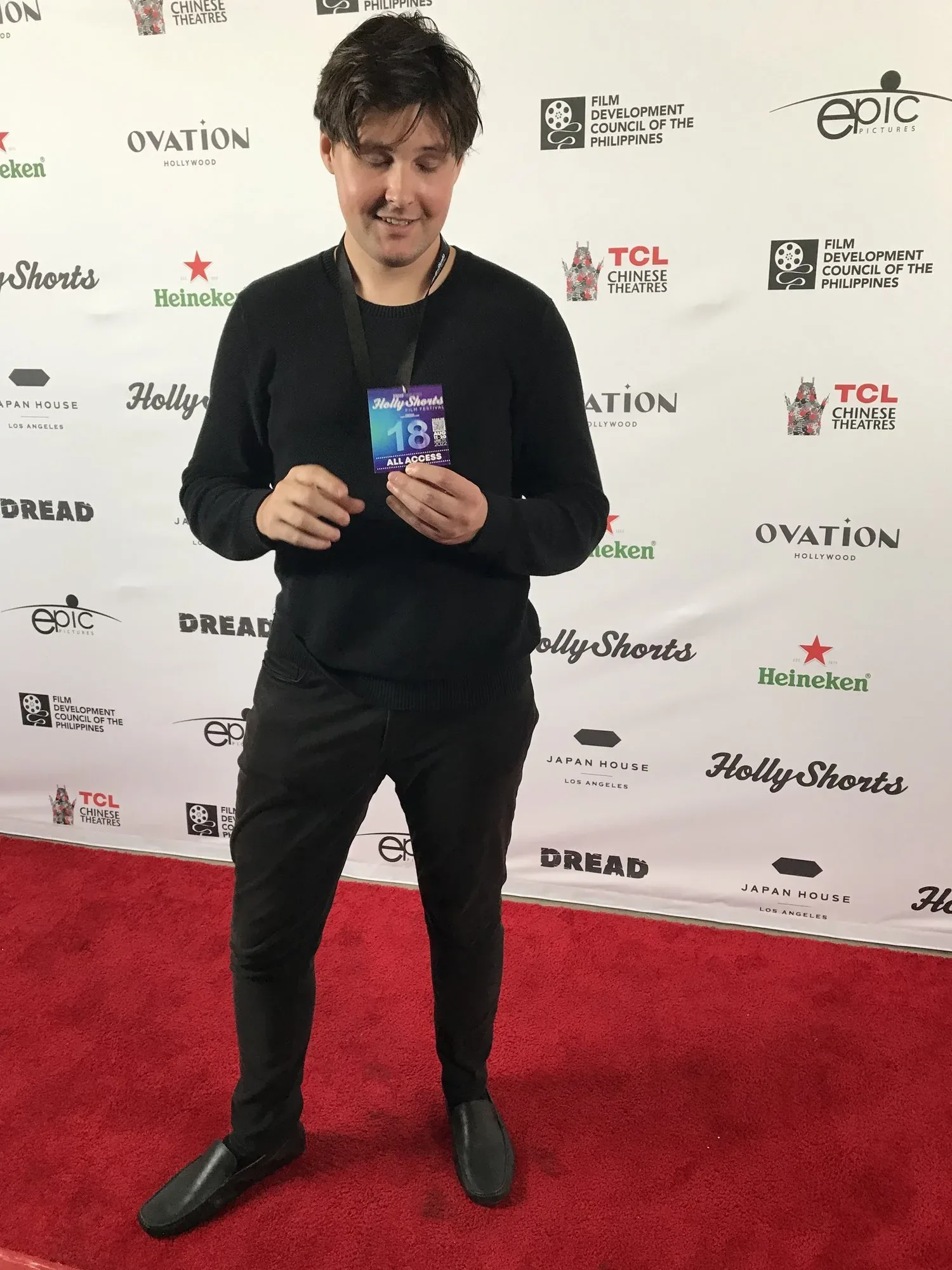 A filmmaker on the red carpet at the 2022 festival.