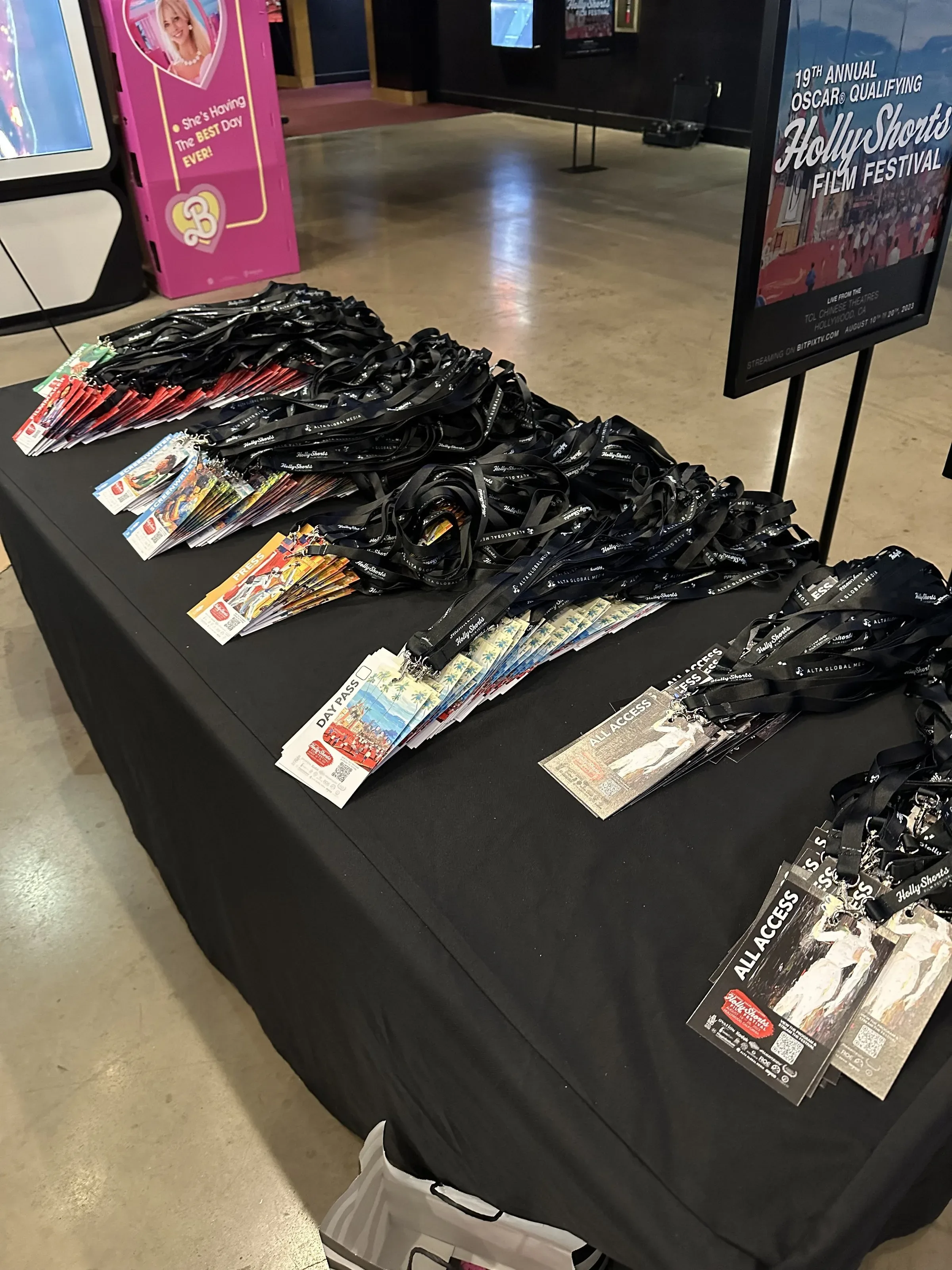 The 2023 badges and lanyards on the check-in table.
