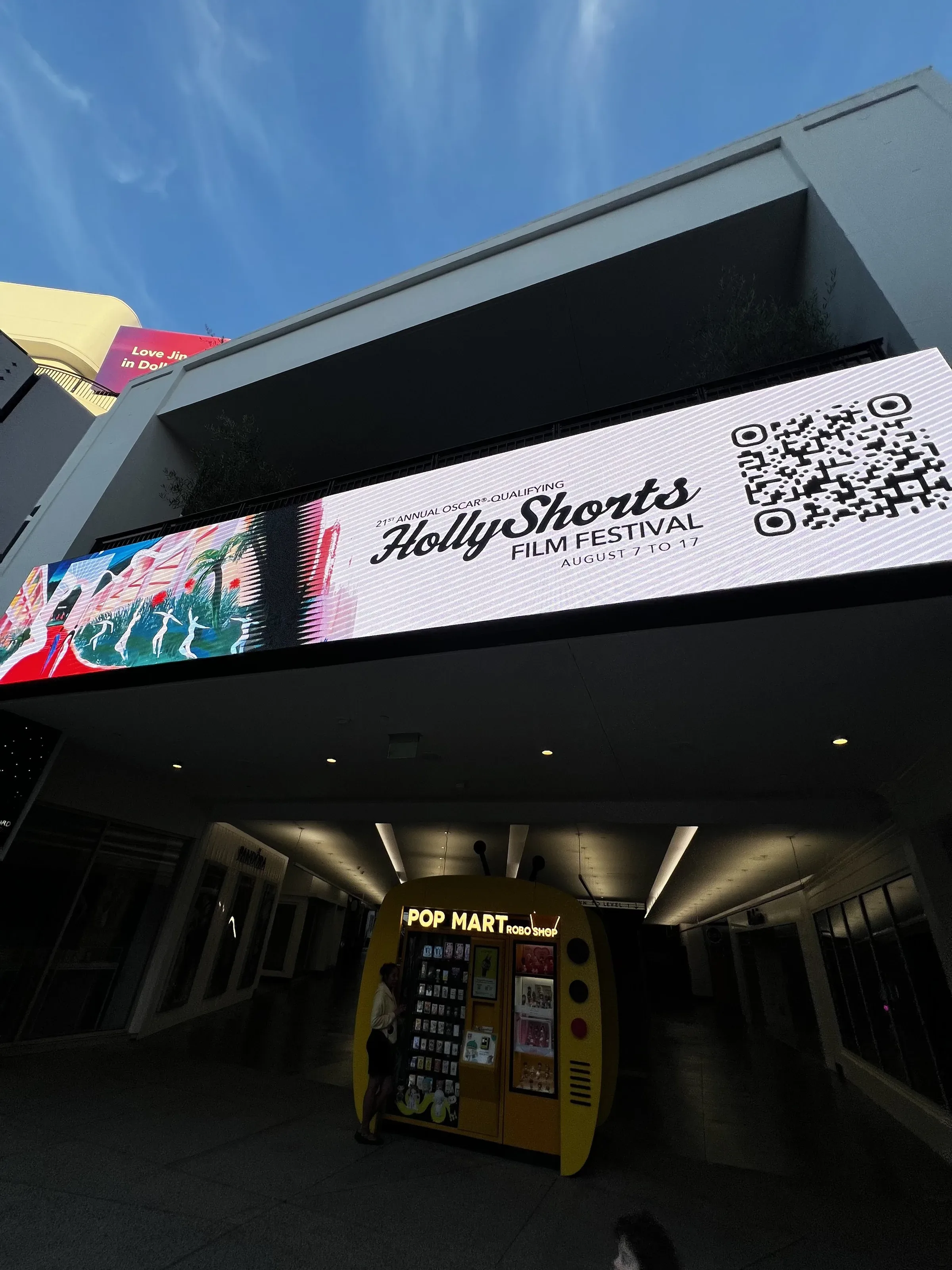 The LED marquee above the theater entrance.