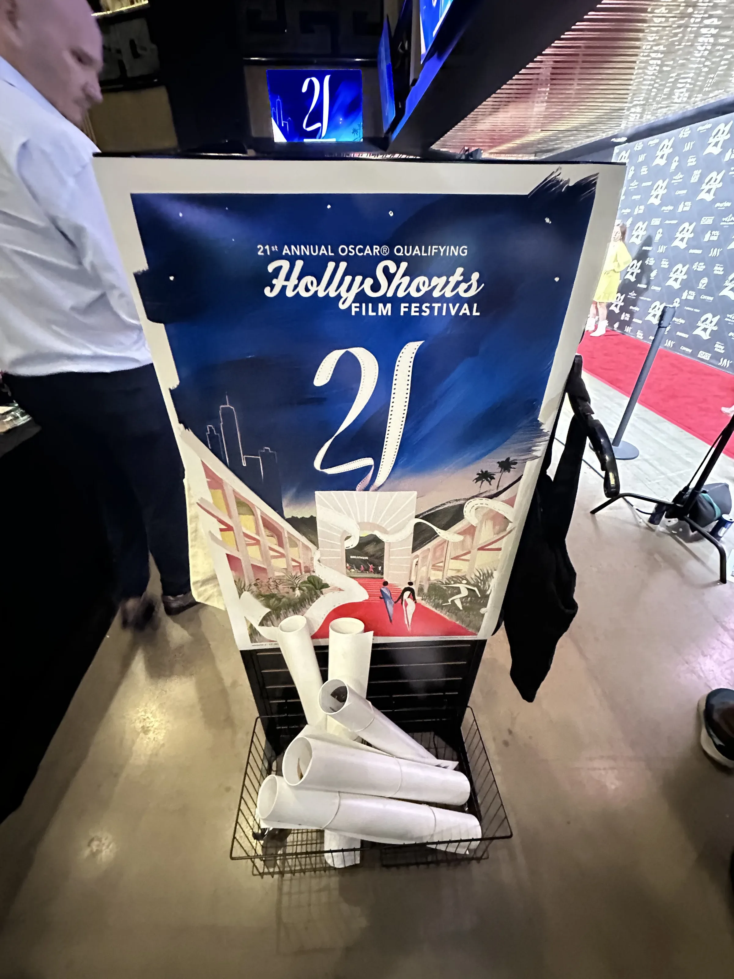 The merch table, with the poster.