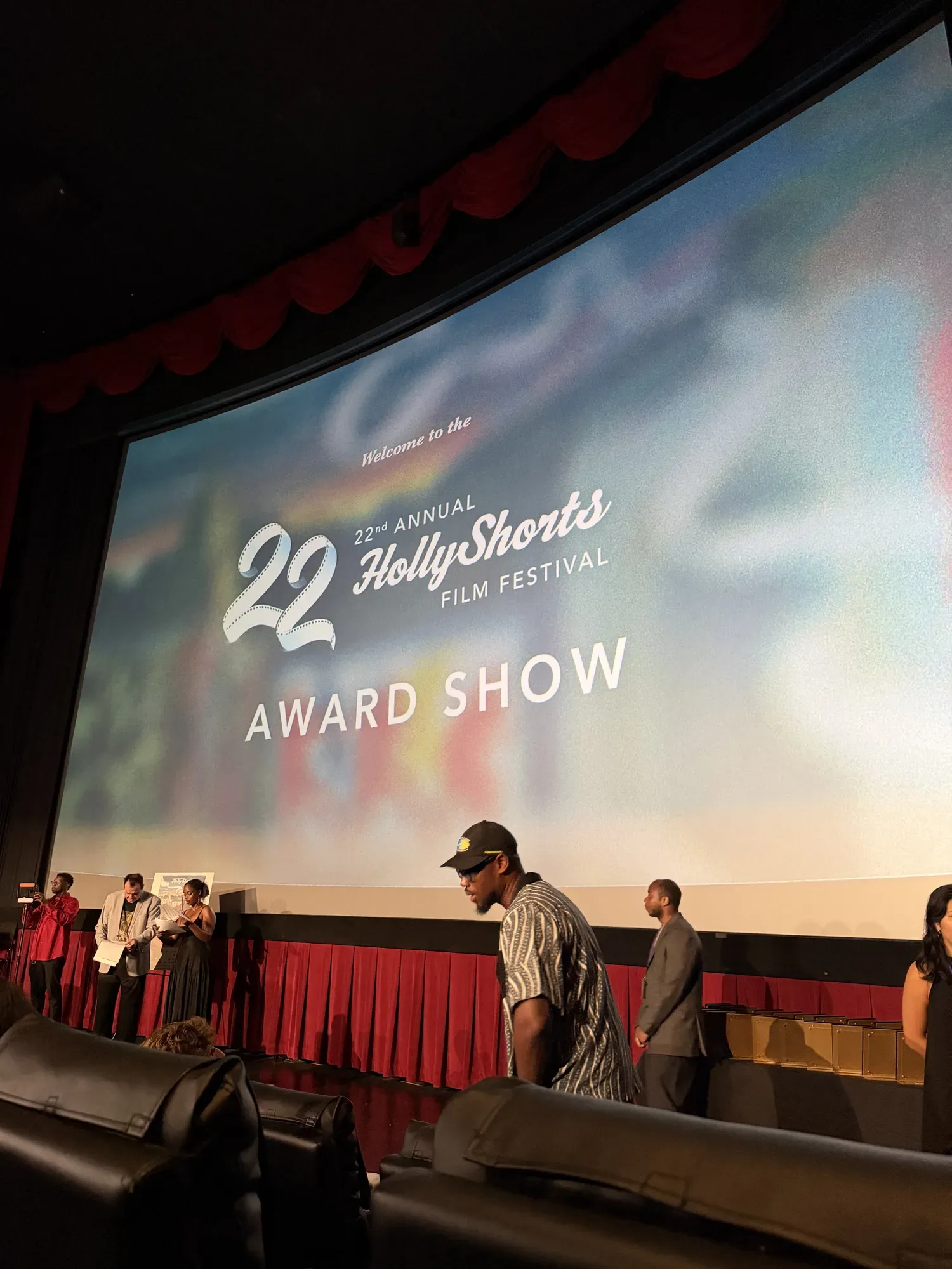 The Award Show title slide on the theater screen