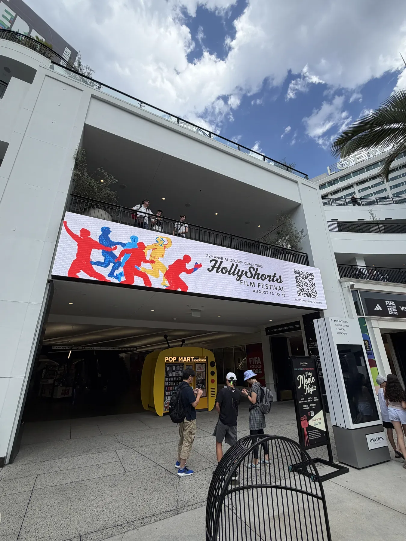 The festival banner, with its dancing figures, over the Ovation Hollywood entrance.