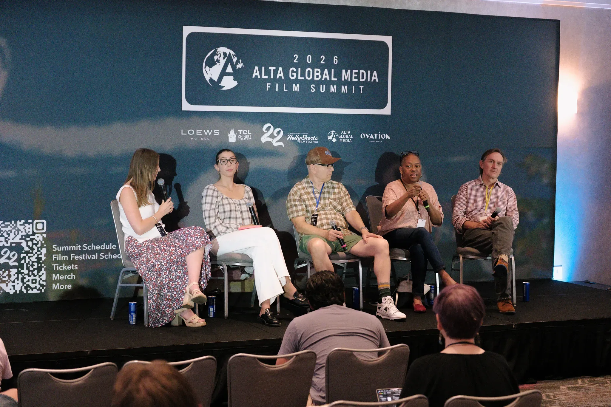 The Alta Global Media Film Summit stage with the HollyShorts 22 backdrop.