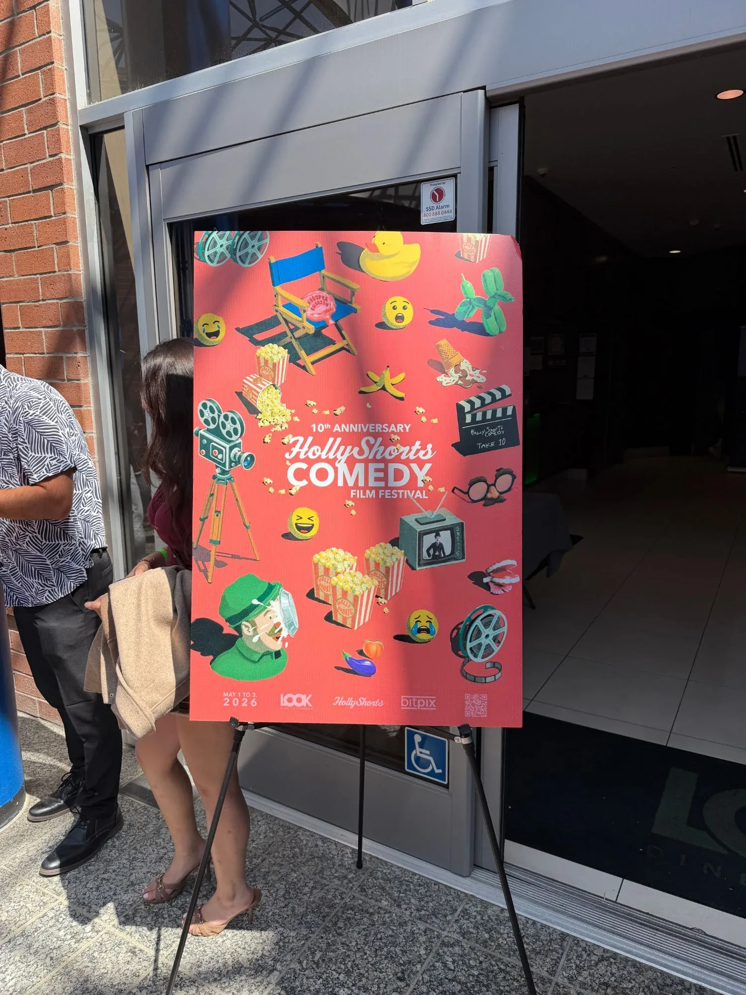The poster on an easel outside the LOOK Dine-In Cinemas entrance