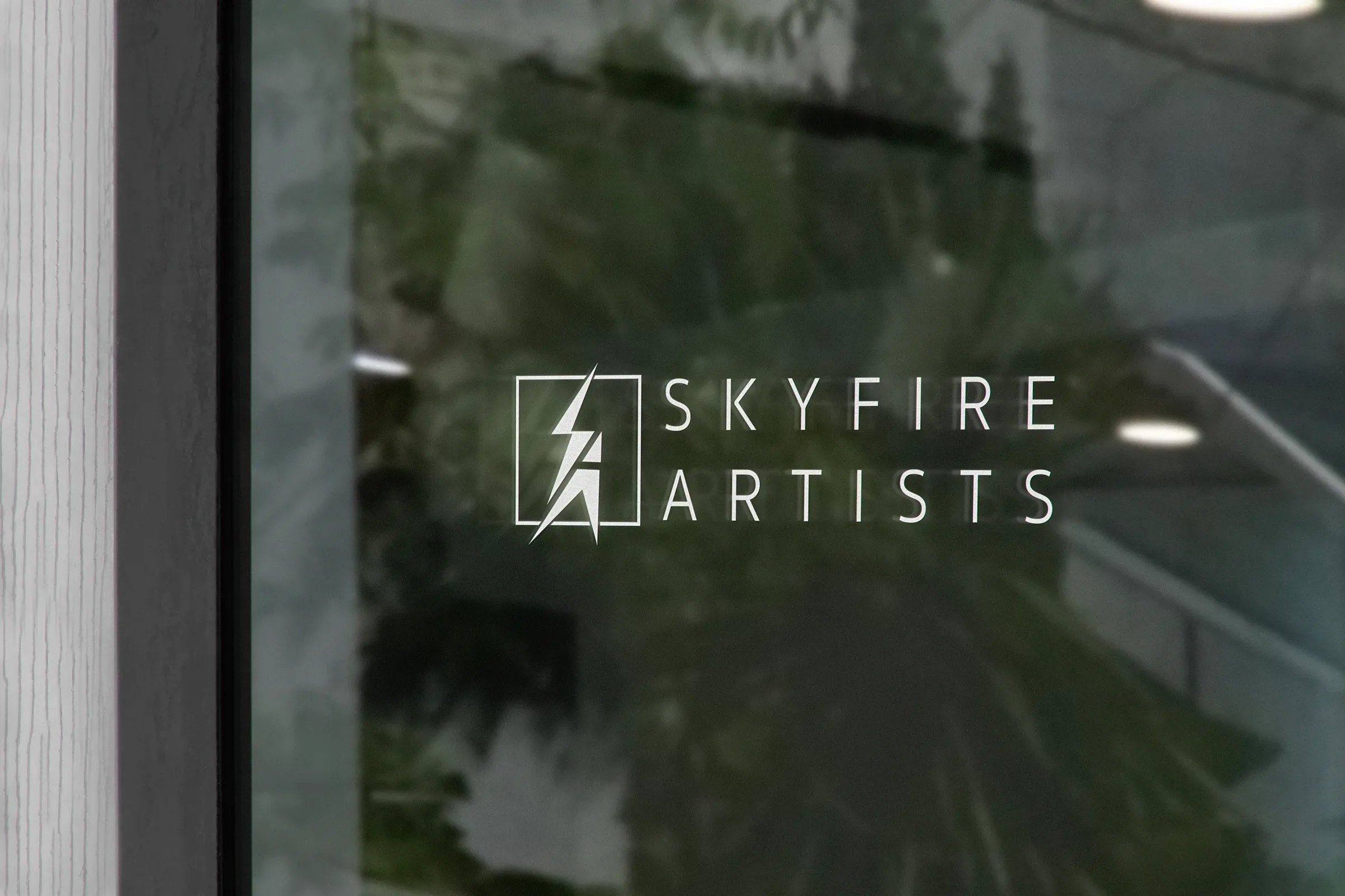 Mockup: the logo on a glass window.