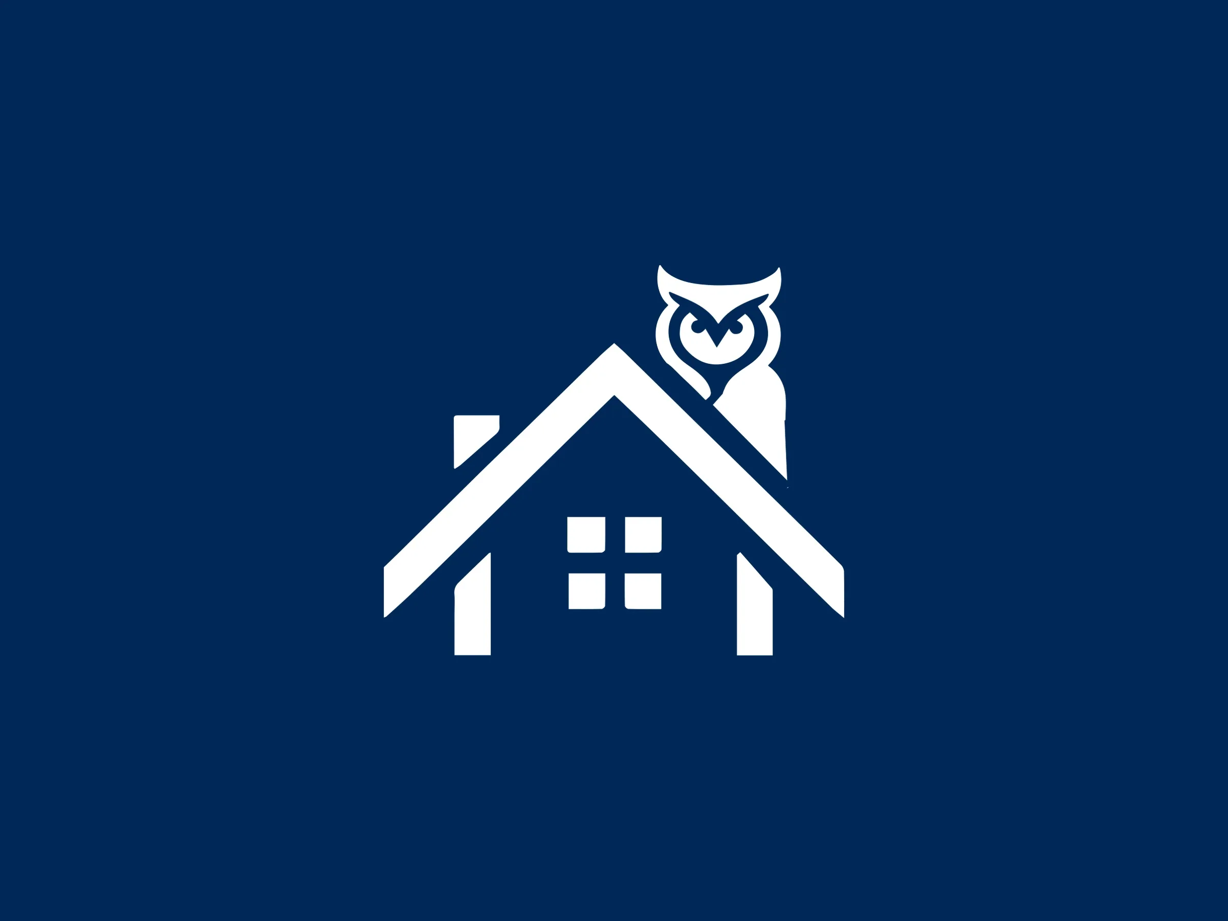 The emblem, an owl on the roof of a house, in white on navy.